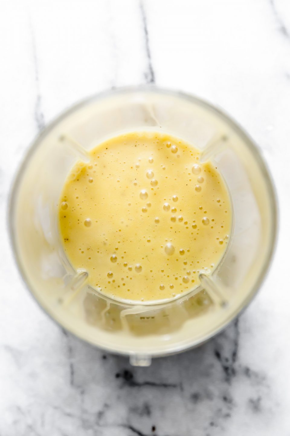 All purpose vinaigrette in blender cup after blending.