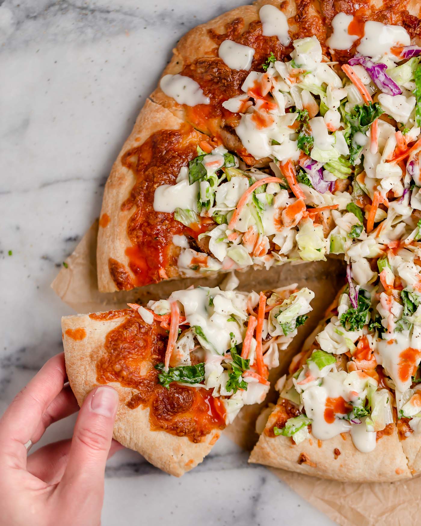 easy buffalo chicken bacon ranch pizza. the easiest buffalo chicken bacon ranch pizza, topped with a fresh & crunchy salad for a fun twist on pizza night! with only 5 ingredients, this buffalo chicken bacon ranch pizza is perfect for an easy weeknight pizza dinner & great for game day parties this fall! #playswellwithbutter #homemadepizza #buffalochickenpizza #chickenbaconranchpizza #pizzanight #easypizzarecipe #easydinnerrecipe #gamedayfood #partyfood