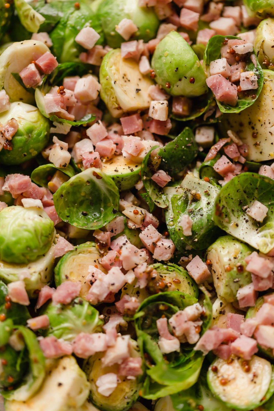 Brussels sprouts with pancetta, tossed in a maple mustard roasting sauce before being roasted.