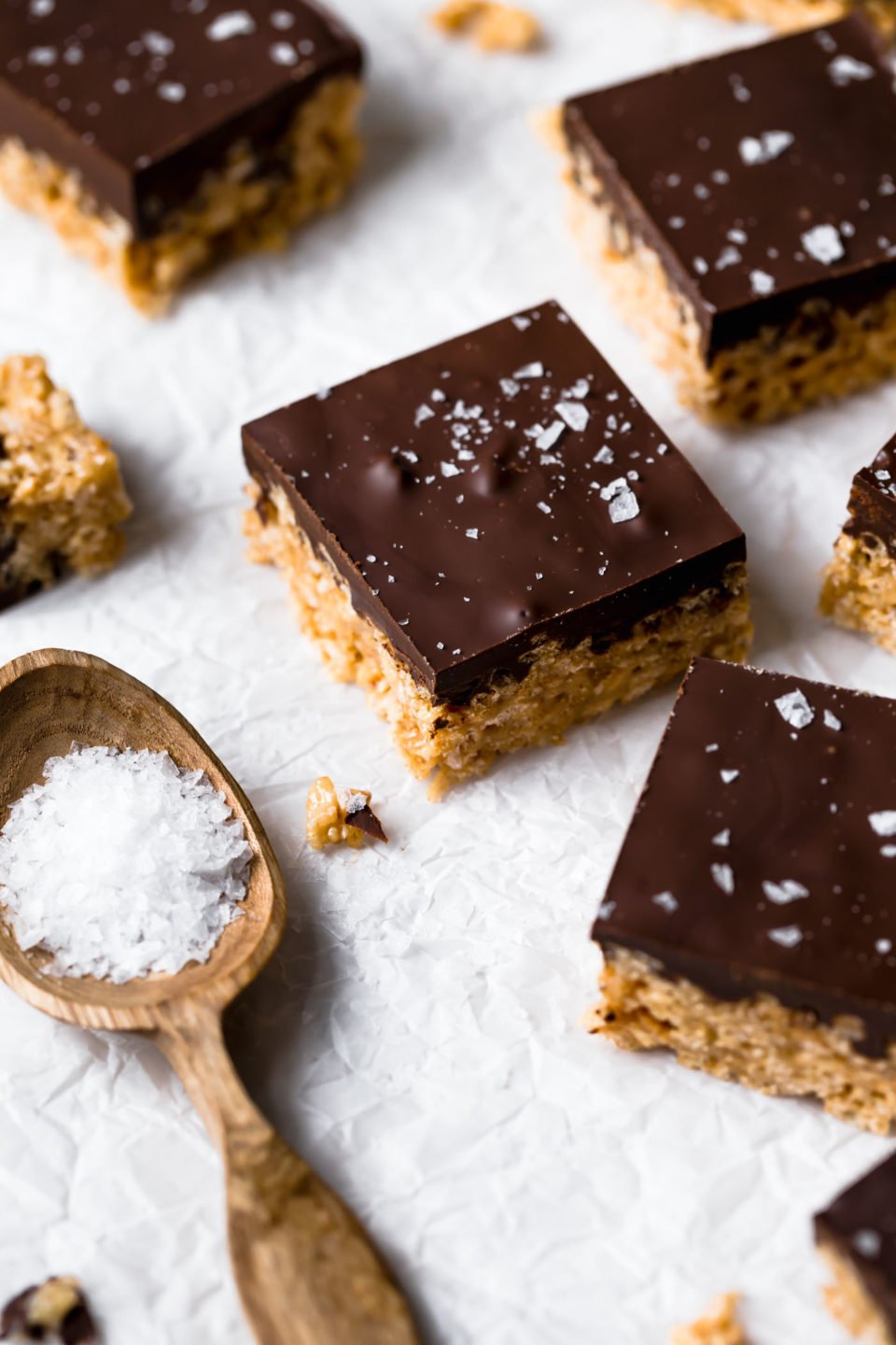 tahini scotcheroos are an update on the classic no-bake summertime dessert we all know & love! these tahini scotcheroos are an allergy-friendly (gluten free, nut free), easy to make treat & they’re perfect for feeding a crowd! #playswellwithbutter #scotcheroos #scotcheroosrecipe #dessert #nobakedessert #nobakebars #allergyfriendly #glutenfreedessert #nutfreedessert