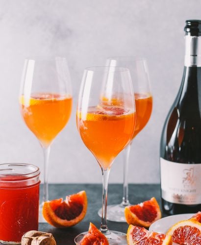 an update to a classic mimosa, these winter citrus mimosas are lightly sweetened with a homemade blood orange & honey syrup | mimosas | mimosa recipe | brunch cocktails | cocktails | cocktails recipe