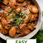 Braised Lamb Ragu with text overlay for Pinterest.